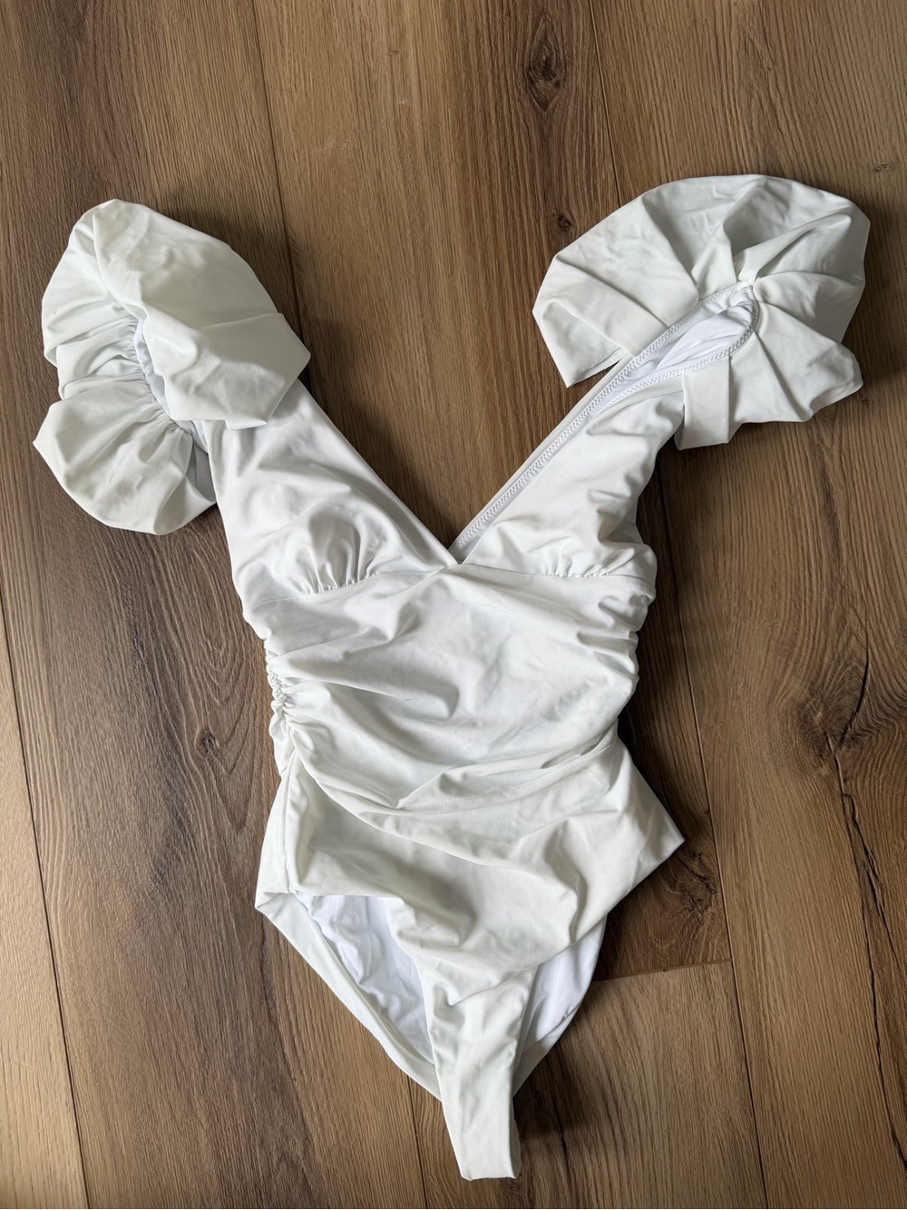 Rebecca Vallance White One-Piece Swimsuit with Ruffled Detail
